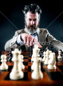 stock-photo-20720566-business-man-playing-chess